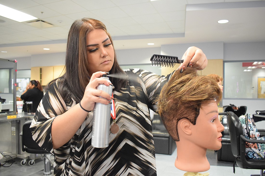Izzy Tapia, a cosmetology student at Manatee Technical College,  loves seeing people&#39;s reactions when she&#39;s done working on their hair or makeup.