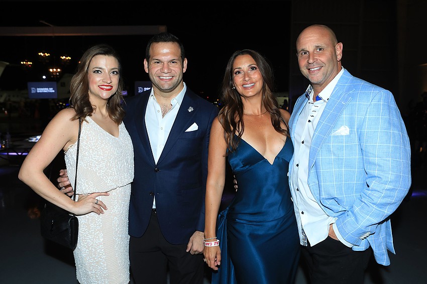 Victoria and mayor Erik Arroyo with  Elizabeth and Tom McDonald