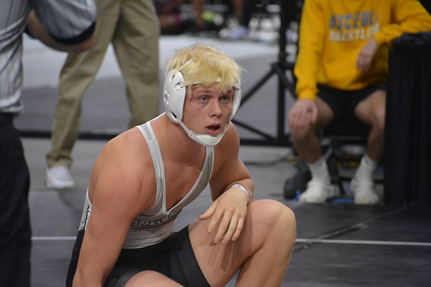 Lakewood Ranch senior Ranson Coons looks to Coach Pat Ancil for advice.