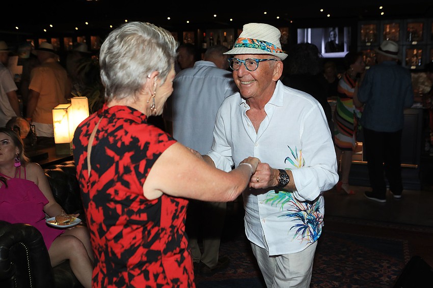 Judith and Ike Koziol dance together.