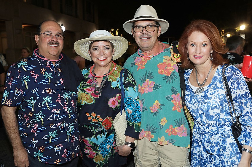Nancy and Rafael Vazquez with John Manca and Angela Neal are dressed for the evening.