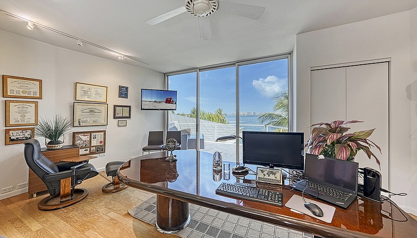An office area affords an over the water view.