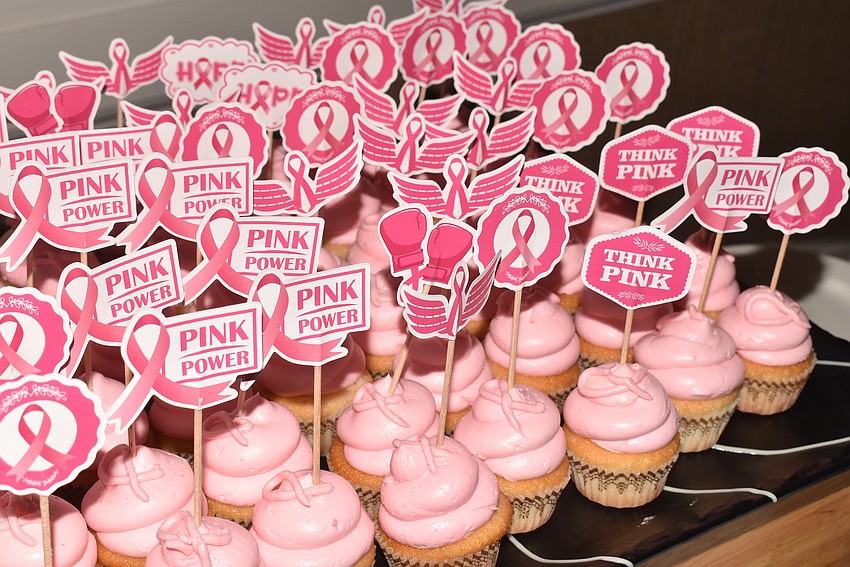 Cupcakes decorated with pink icing were waiting for after lunch.