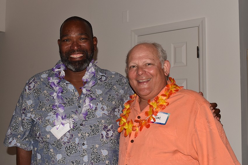 Charles Hawkins and Tom Heutel caught up with each other over snacks.