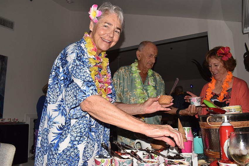 Peggy Stitzenberger fixes up an ice cream dish.