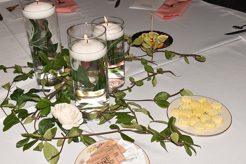 The tables were decorated for the garden party theme.