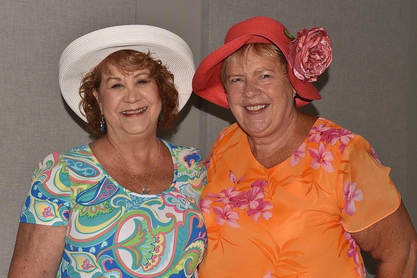 Kathi Clements and Chaleen Tierney wore hats for the party.