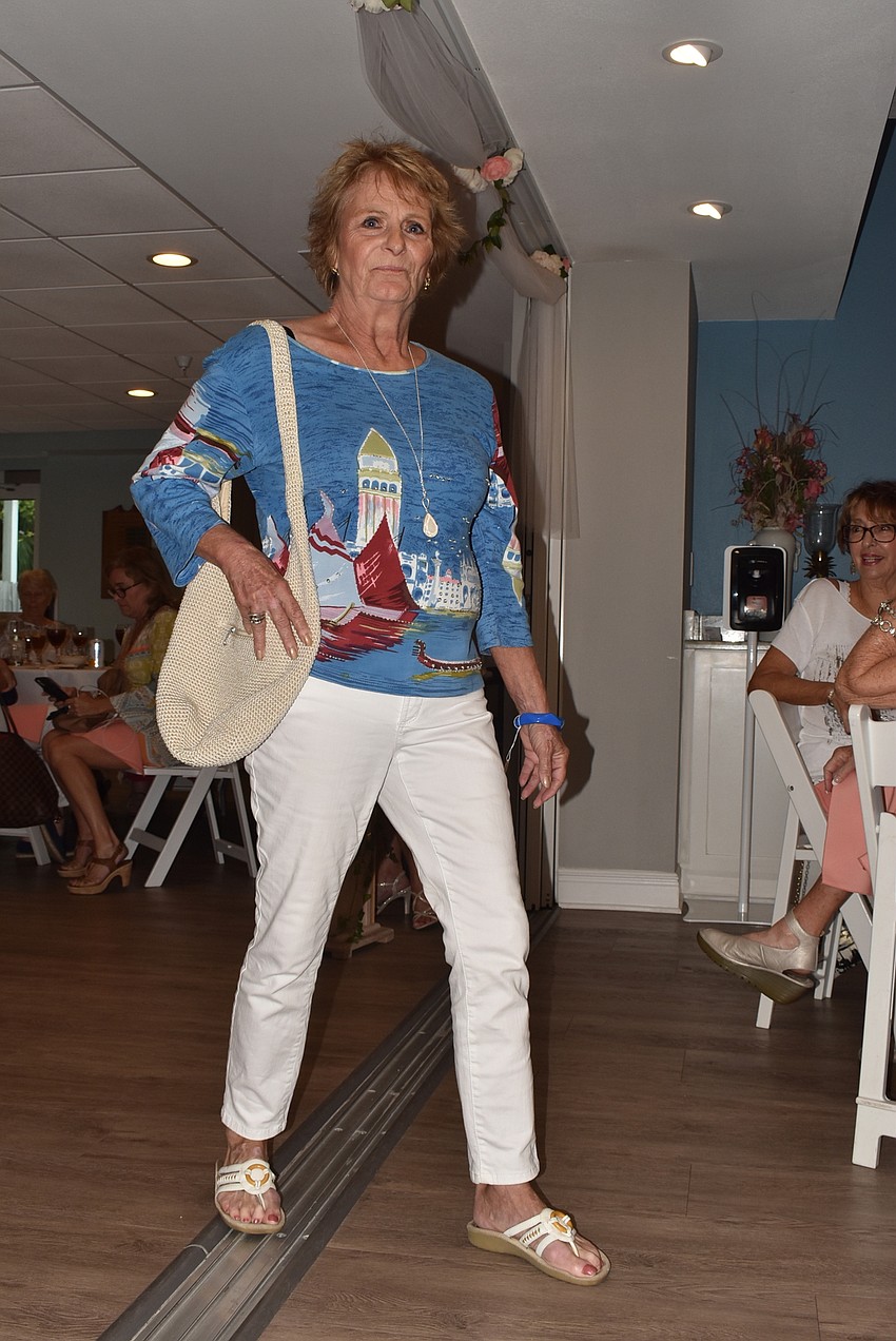 Dona Patruccelli steps out in a Jane Ashley top and Not Your Daughter's jeans.