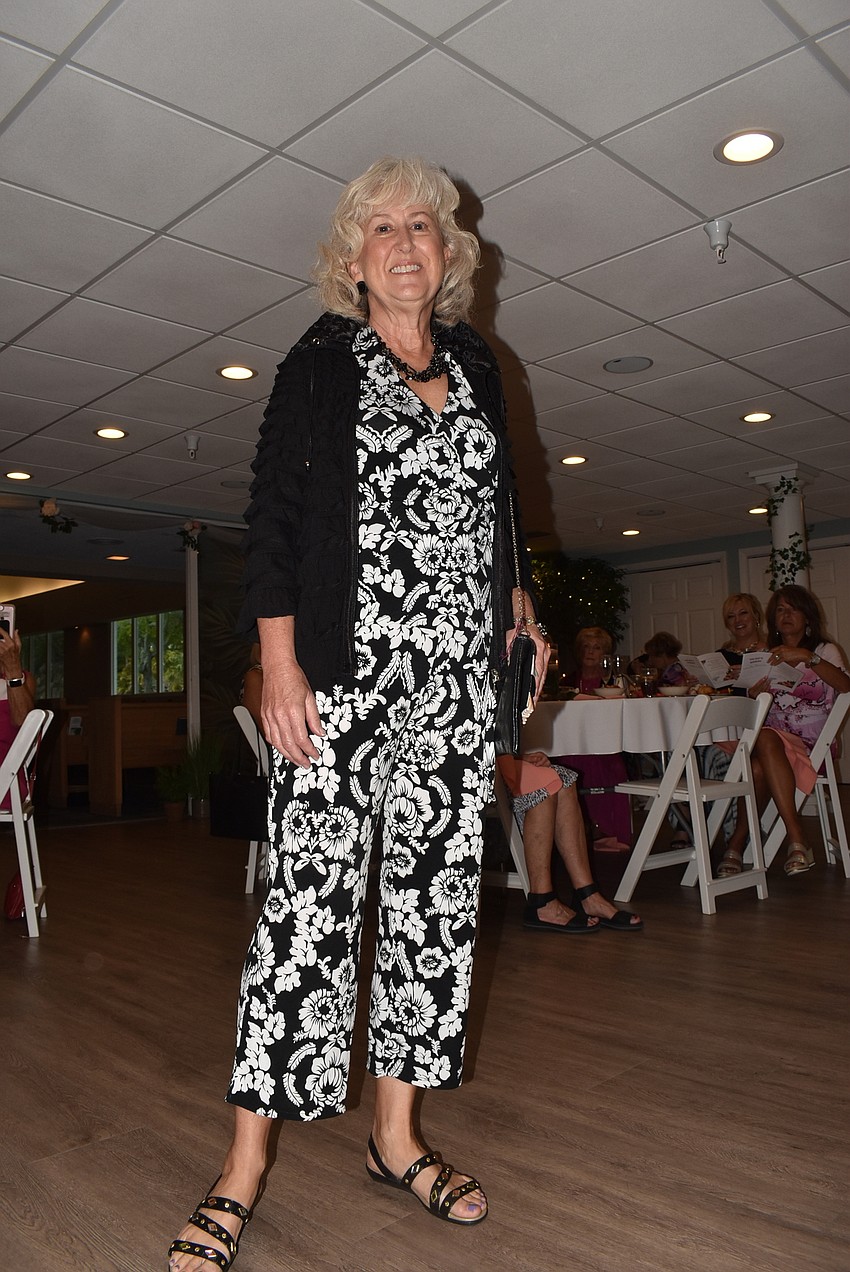 Renee Lynch shows off a two-piece outfit.