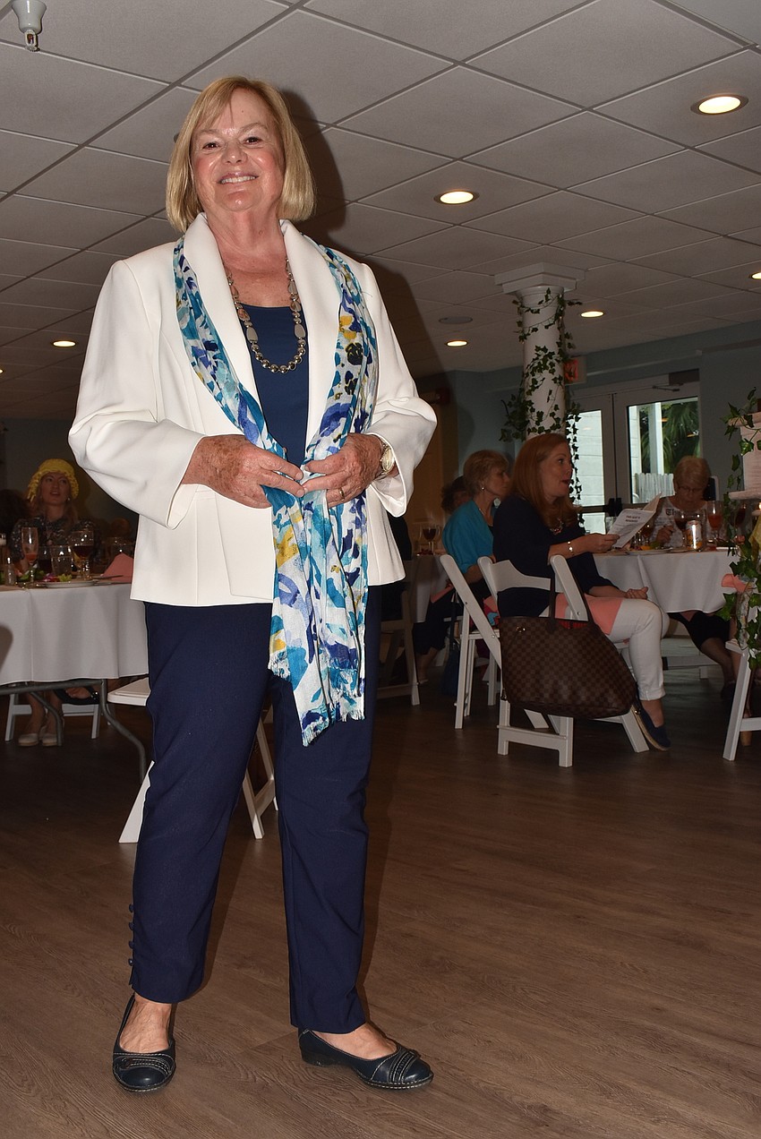 Muriel Klosterman wears a statement scarf for her lunch outfit.