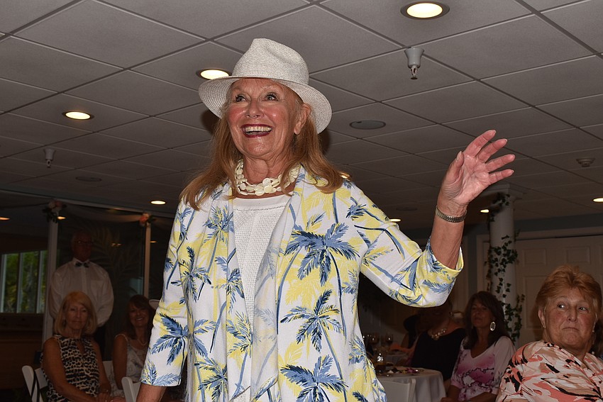 Jan Dube waves to the crowd in her Patchington jacket.