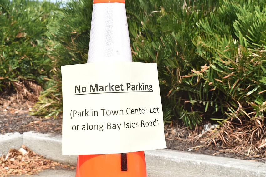 The town put out cones to remind people not to park at Publix.