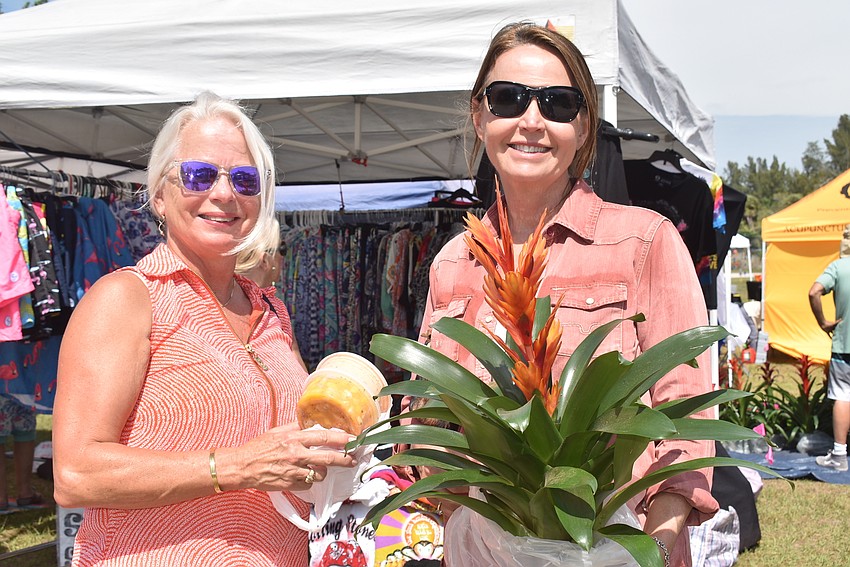 Linda Crouse and Michell Higdon left the market with a bromeliad.