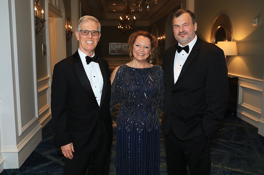 Interim head of school Jim Connor, upcoming head of school Deb Otey and board chair Tom Murphy
