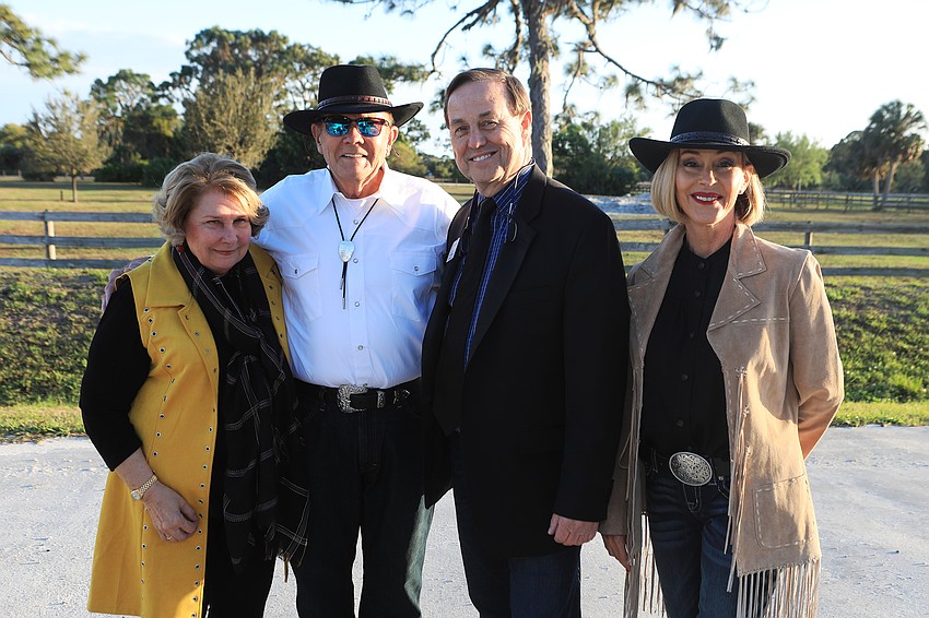 Bob and Lynn Hoff with president and CEO Tom Waters and Janet Rice