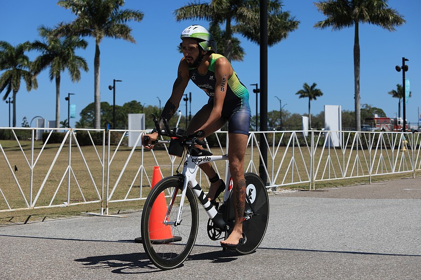 Antonio Ruiter bikes through the park.