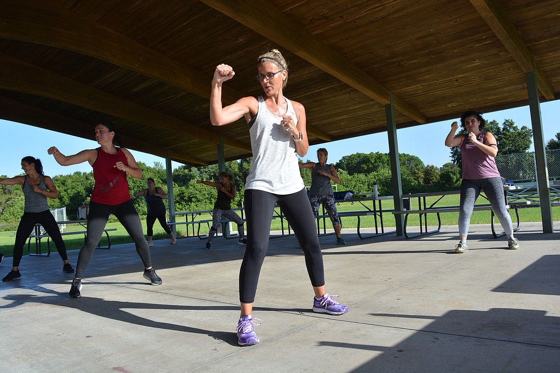 East County&#39;s Meghan Rumbaugh participates in a group exercise class in May 2020.