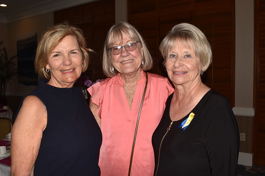 Kathy Brooks, Mary Willard and Gayle Sobieck caught up before Sobieck went to model.
