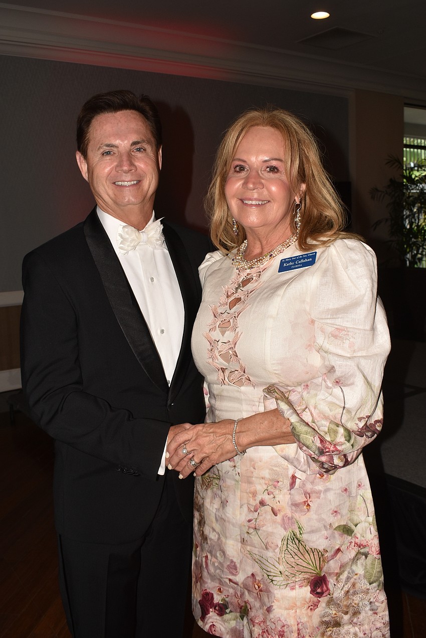 Todd Callahan and Kathy Callahan spent time together before going off to their escort and chair duties.