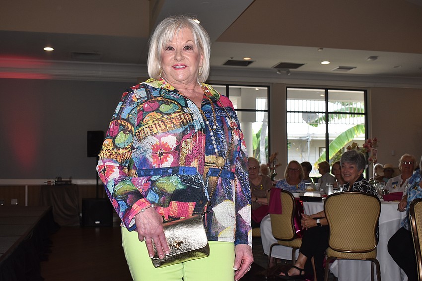 Linda Olsen shows off a colorful outfit.