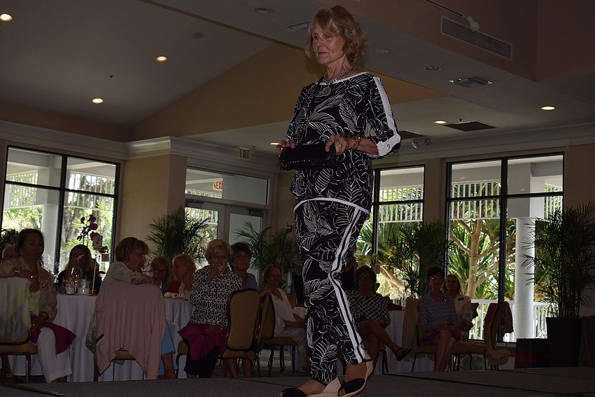 Mary Jane Tolpa wears a black and white outfit for her first pass.