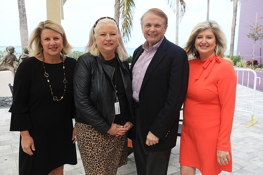 Manatee Chamber of Commerce president Jacki Dezelski, Miqui Lora, Larry Thompson and Sarasota Chamber of Commerce president Heather Kasten