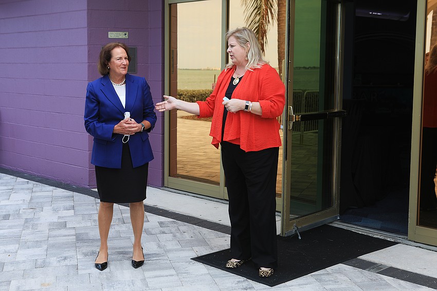 Town Hall Chair Ashley Brown welcomes Karen Mills to a VIP crowd.