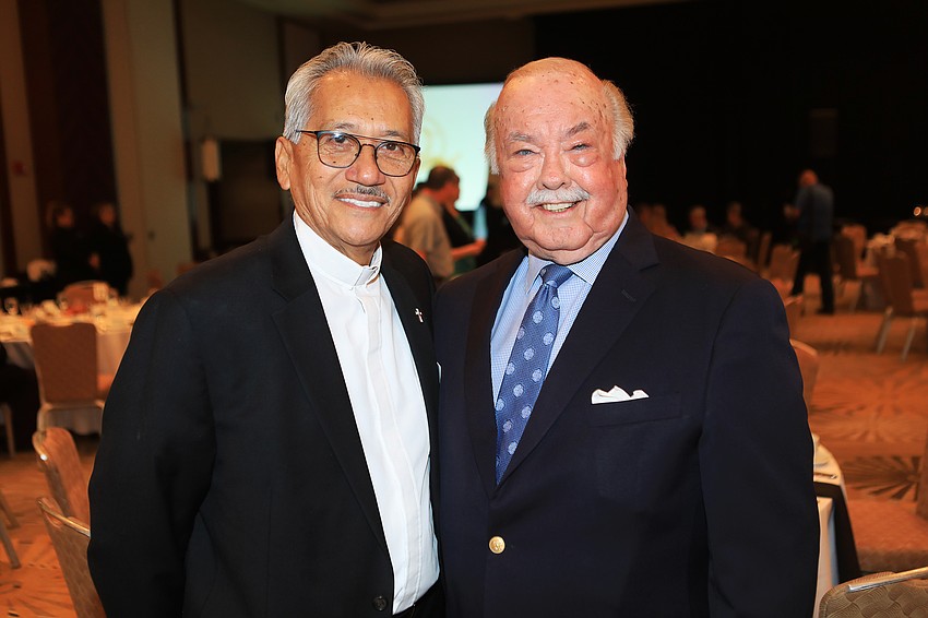 Deacon Humberto Alvia and Joel Swallow