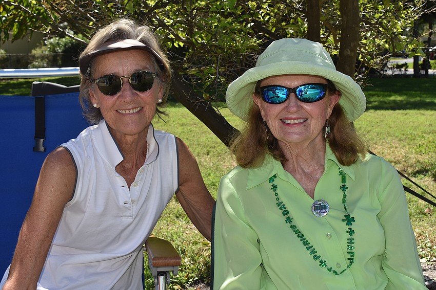 Mimi McMillan and Maureen Shea found some shade.