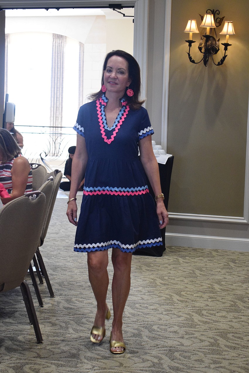 Lakewood Ranch's Cheryl Lambiase models a layered dress.