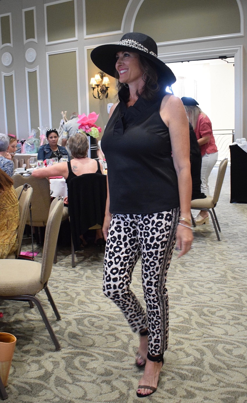 Lakewood Ranch's Iolanda Goodfellow models animal print clothing.