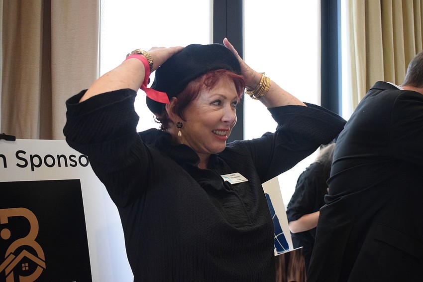 Lakewood Ranch's Gwen McKenna puts her hands on her head to show that she chooses heads in a game of 