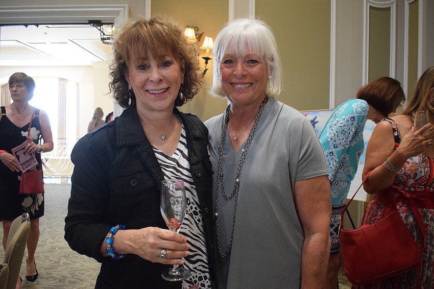 Lakewood Ranch's Teresa Morris and Sharyn Nassau attend Divas and Dogs to support the Humane Society at Lakewood Ranch and their friend, Cheryl Lambiase, who is modeling in the fashion show.