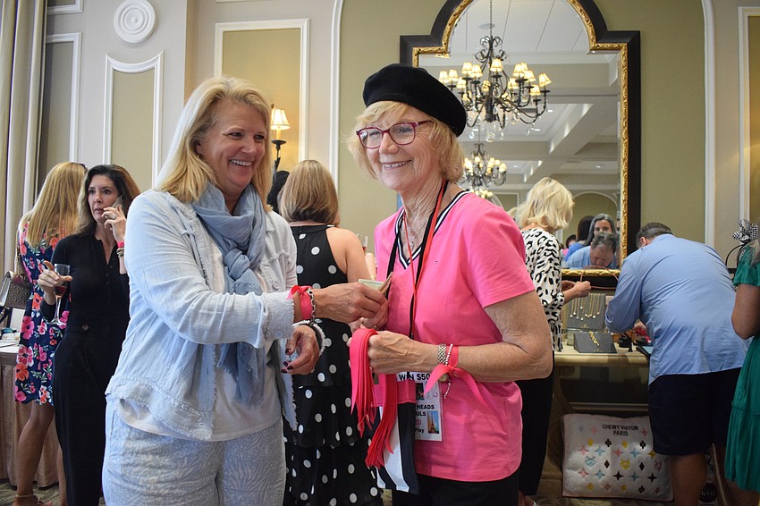 Lakewood Ranch's Joni Lolli purchases a ribbon to participate in the 