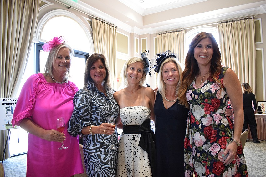 Lakewood Ranch's Betsy Forkin, Michele Caba, Bonnie Brooks, Tara VanderSande and Casey Baynes can't wait for the fashion show.
