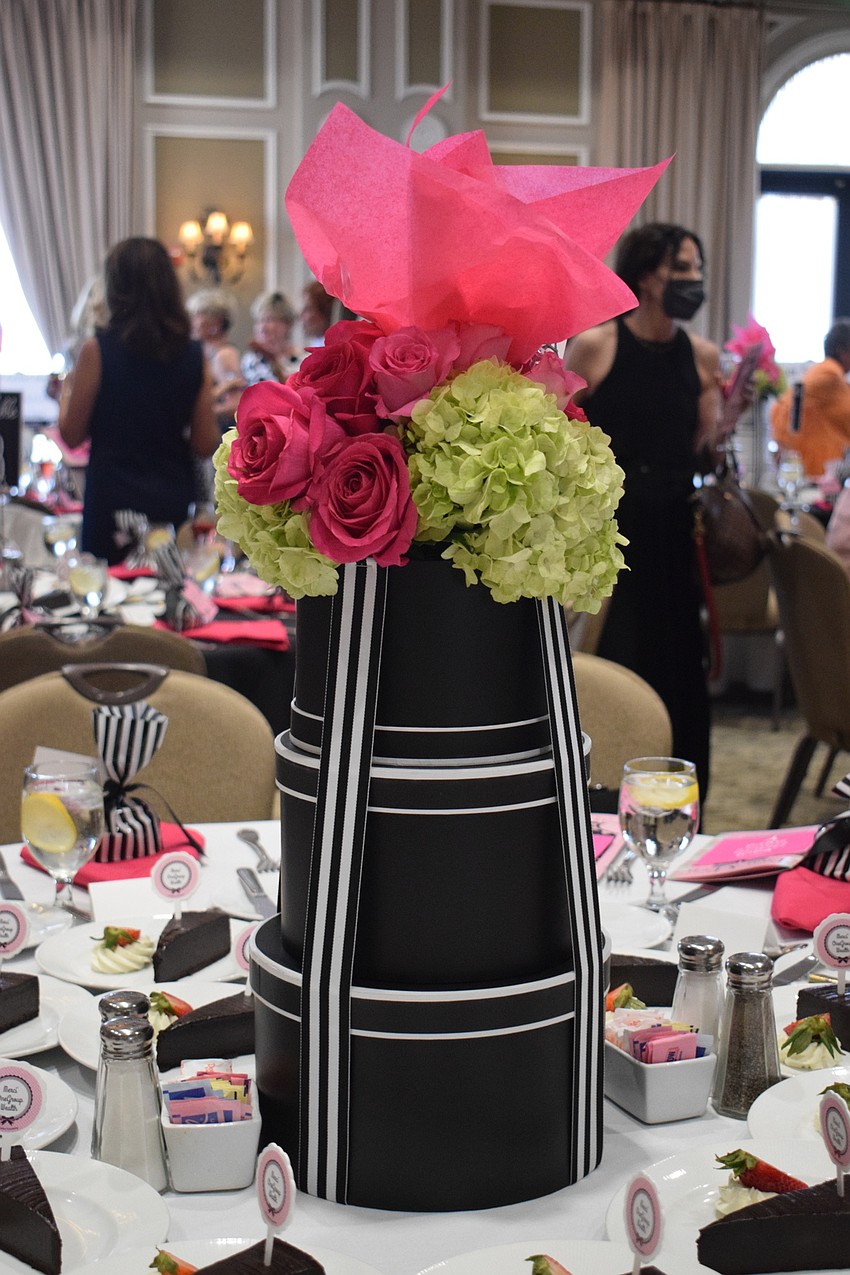 The Divas and Dogs event has a Paris theme with centerpieces that were sold to raise money for the Humane Society at Lakewood Ranch.