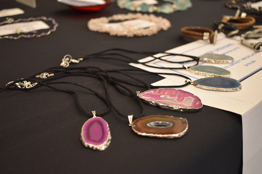 Items crafted by Mary Litle include these geode necklaces.