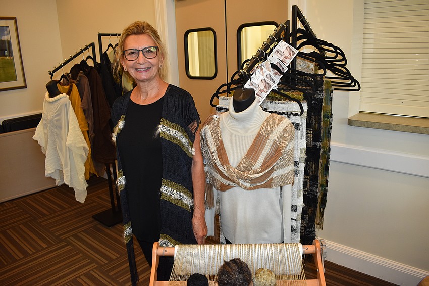 Deborah Jernigan demonstrates one of her all-natural garments.