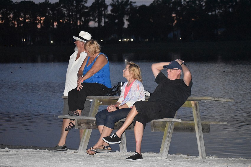 East County's Allen and Gloria Brush and Sarasota's Christine and Andy Fowler found perfect seats at Nathan Benderson Park.