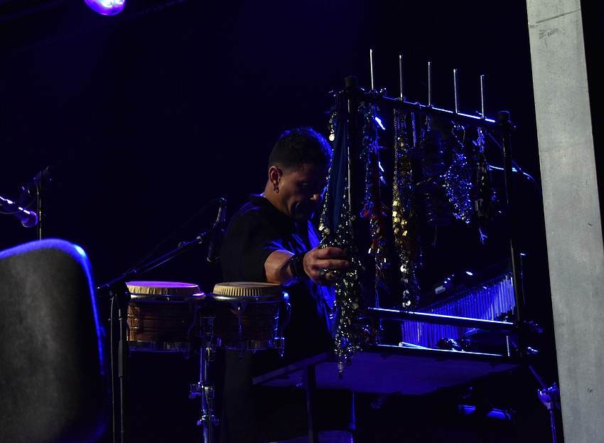 Arturo Sandoval's drummer and percussionist, Ricardo Pasillas, adds some unique sound effects to the music.