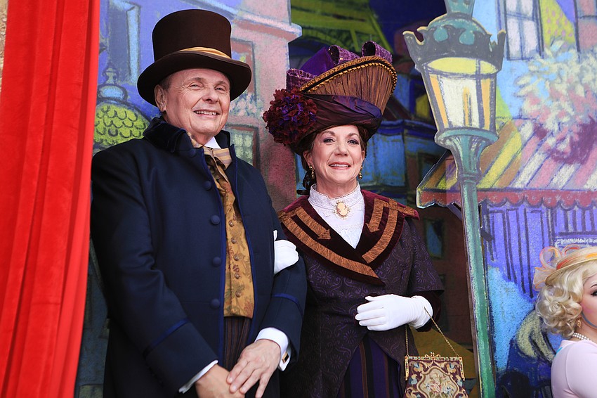 Larry and Pat Thompson dress in Parisian style.