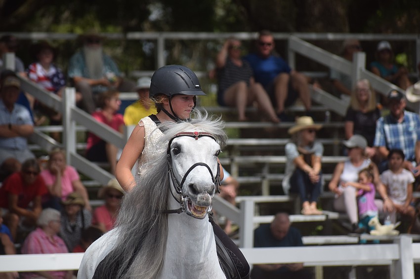 Sydney McCullough entertains the crowd aboard Achilles.