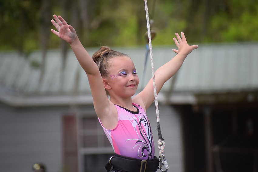 Only 7, Harley Johnson didn't seem nervous at all before her trapeze act.