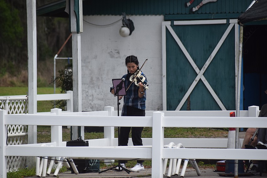 Sarasota's Danae Tran entertained the crowd with a violin solo.