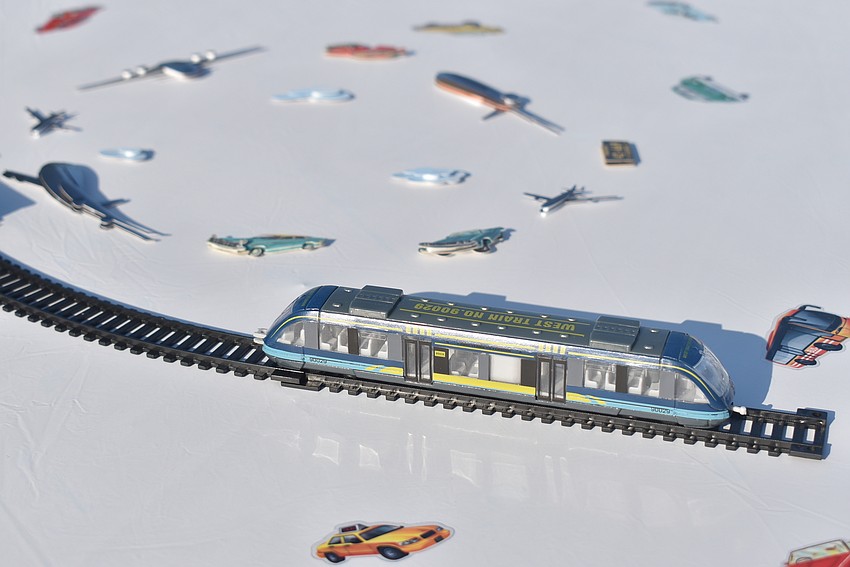 Fittingly, the tables were decorated with planes, trains and automobiles.