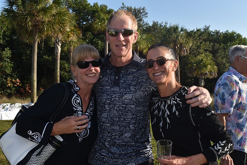 Caritha Greeley, Peter Smith and Pamela Mogul staked out a spot at their table.
