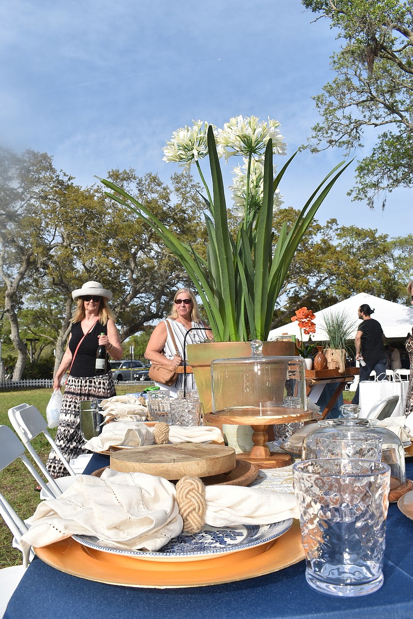 The Whisnant family brought a flower arrangement and cloth napkins to their setup.