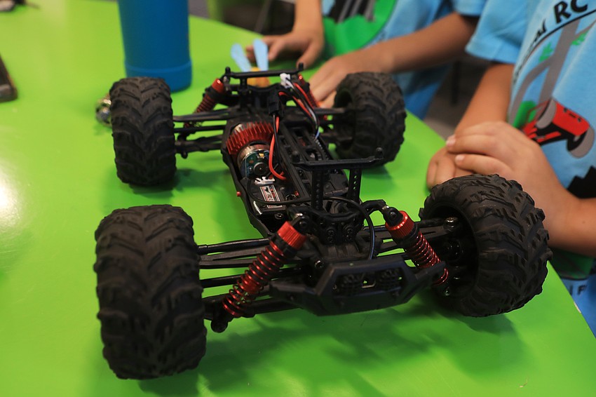 Racers put together their cars at the lab months in advance.