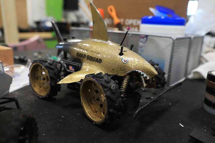 Racers put together their cars at the lab months in advance.