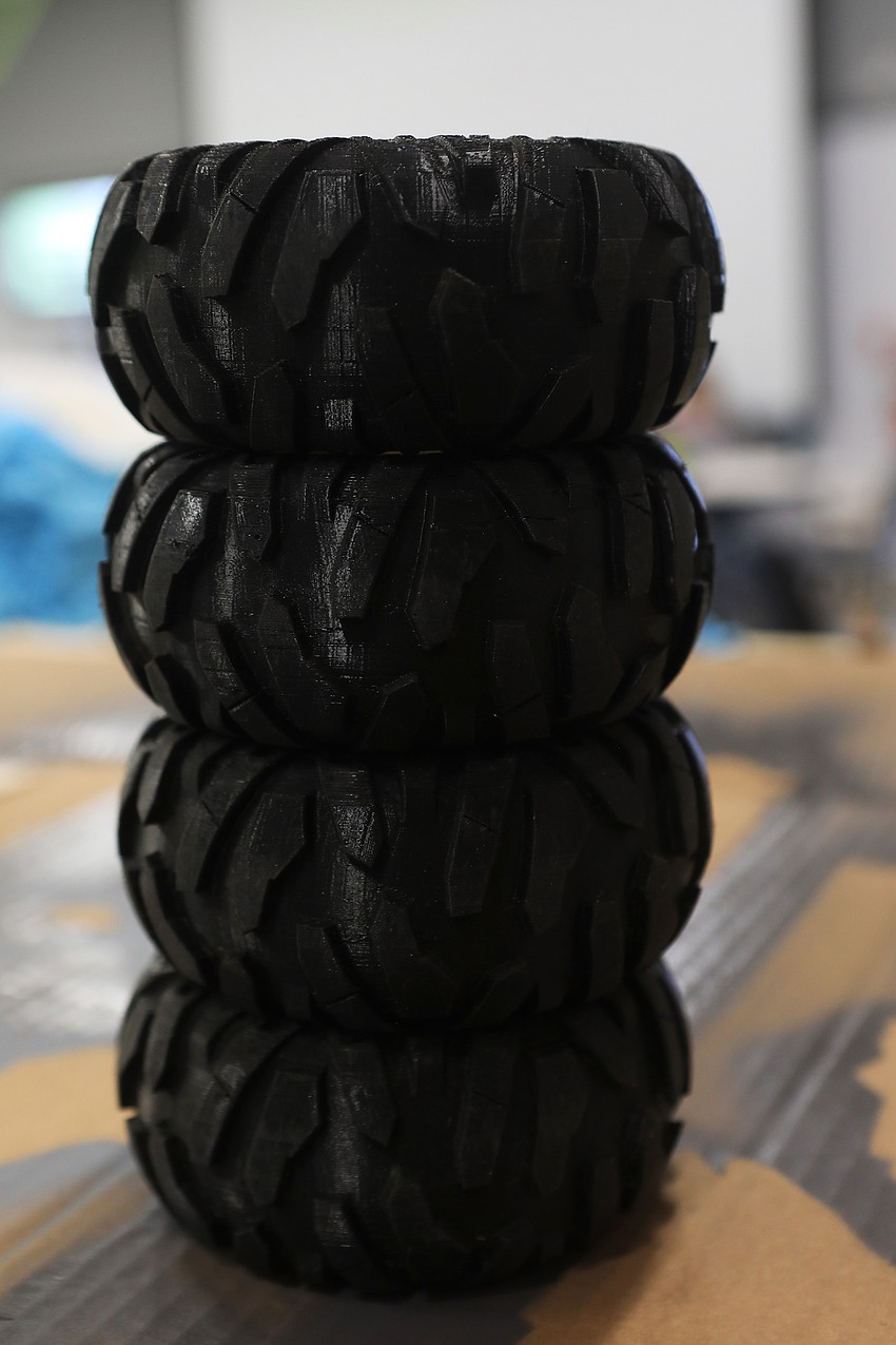 Fab lab staff create tires with 3D printers.